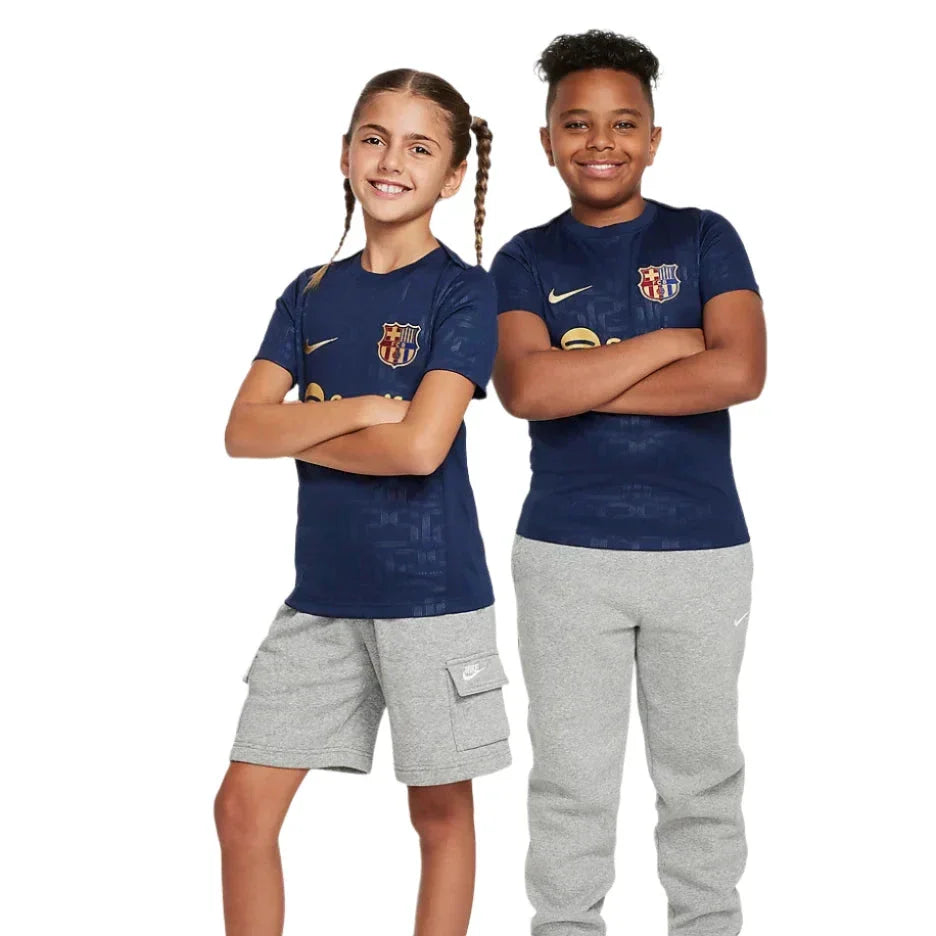 F.C. Barcelona Academy Pro Home Older Kids' Nike Dri-FIT Football Pre-Match Short-Sleeve Top
